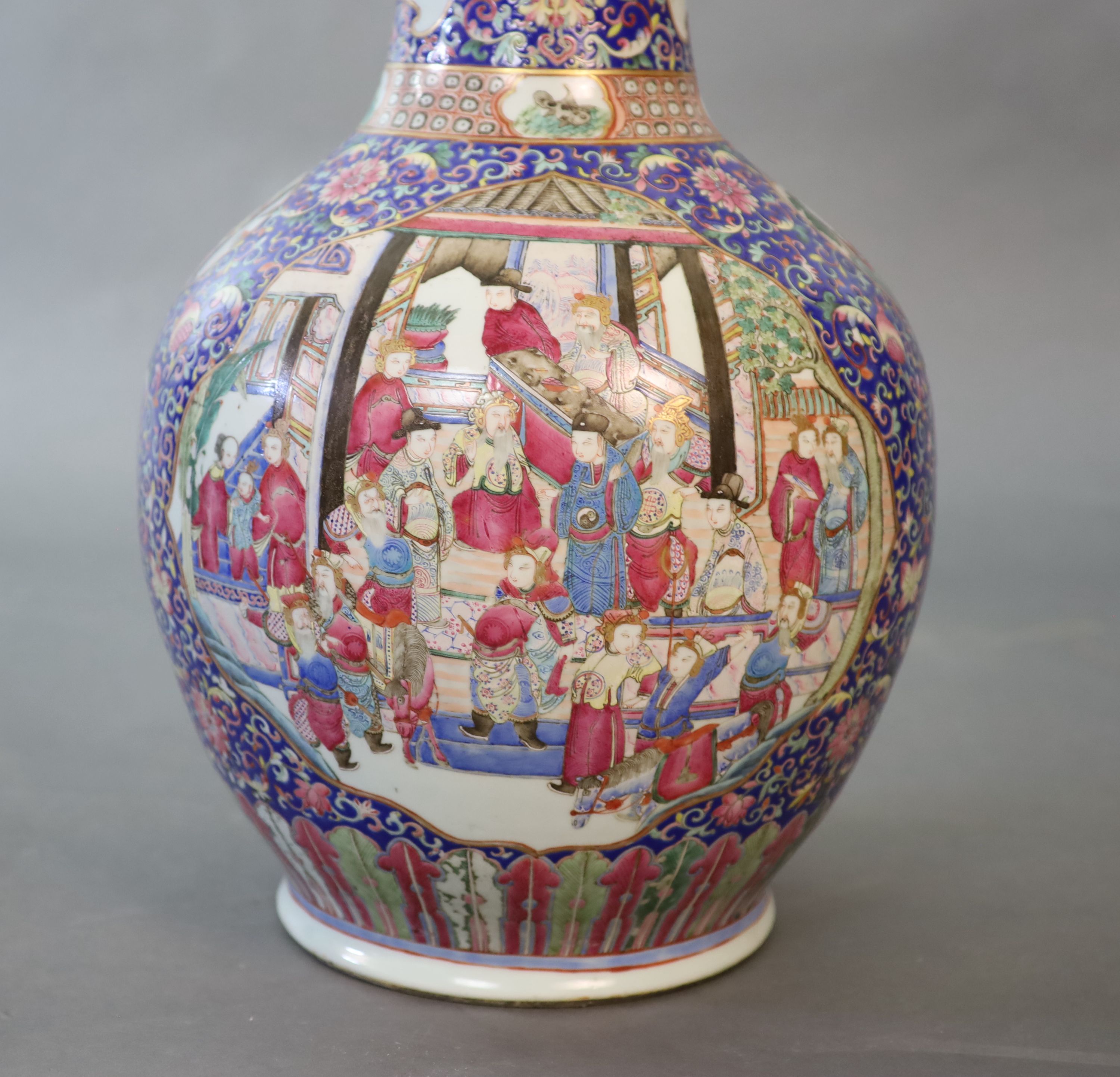 A massive Chinese blue ground bottle vase, Daoguang period (1821-50), 88cm high, neck broken and re-glued